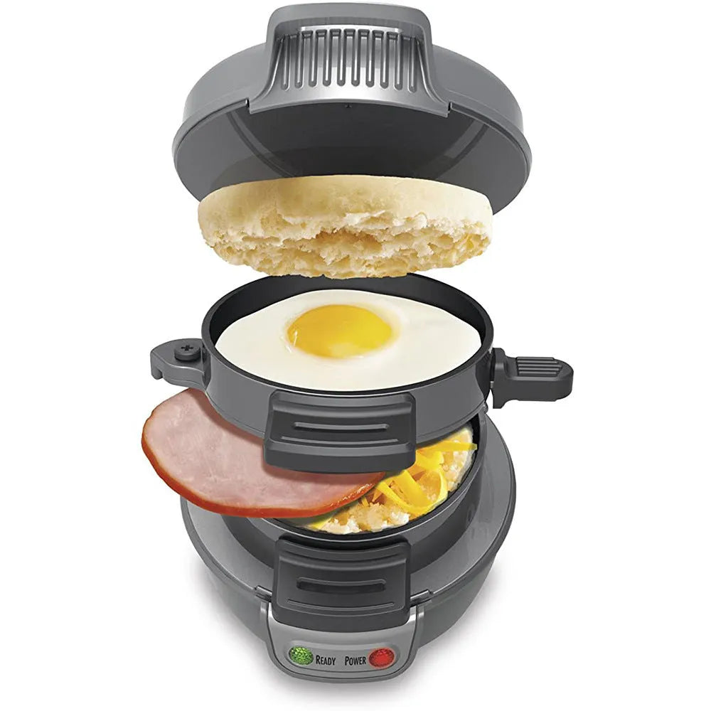 Bright red household breakfast sandwich maker with egg cooker ring and waffle plates on a kitchen counter.