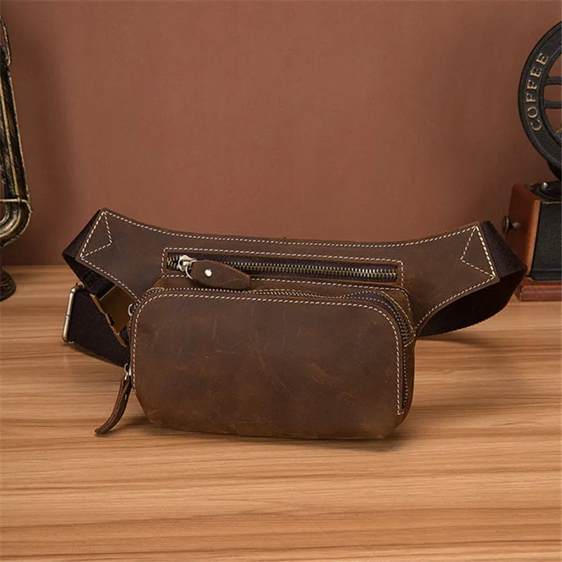 Brown men's cowhide sports waist bag shown with pull closure.