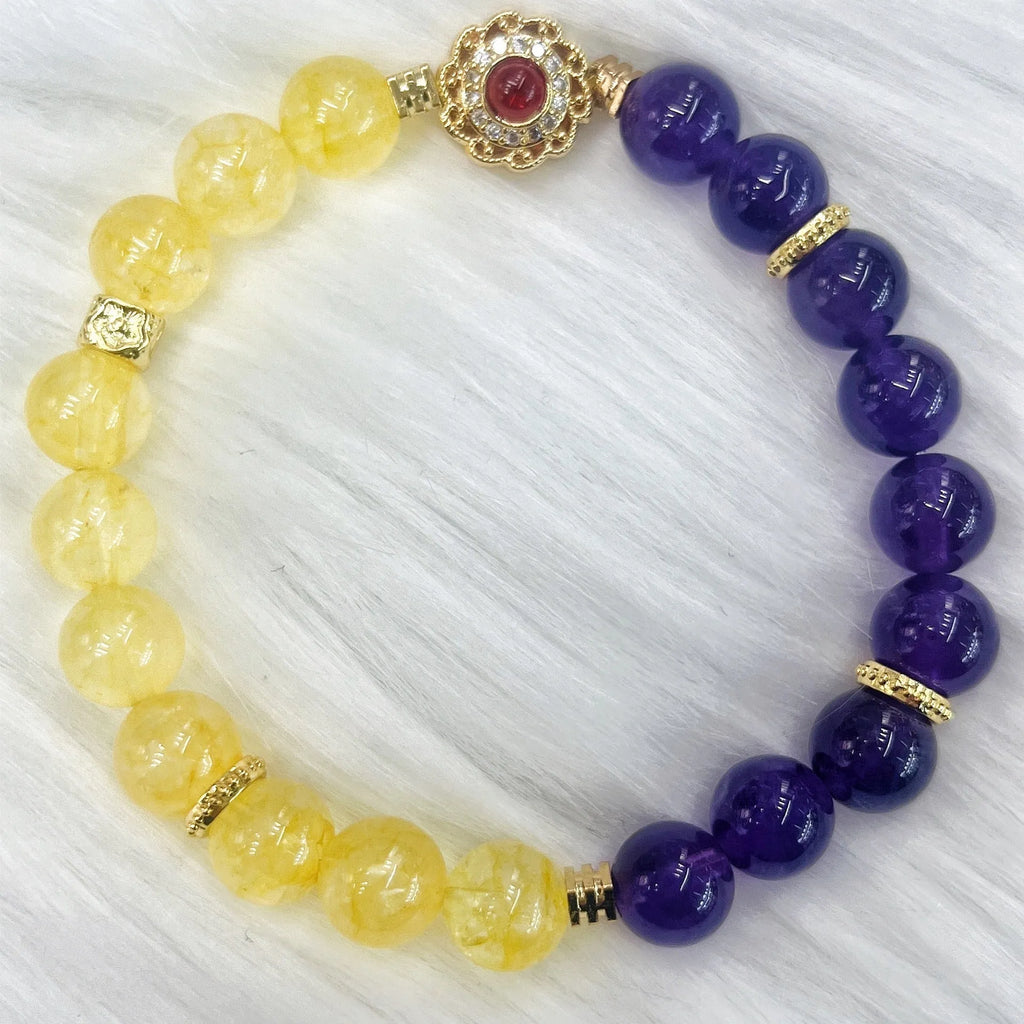 Handmade women's yellow and purple amethyst crystal bracelet showing manual craftsmanship details