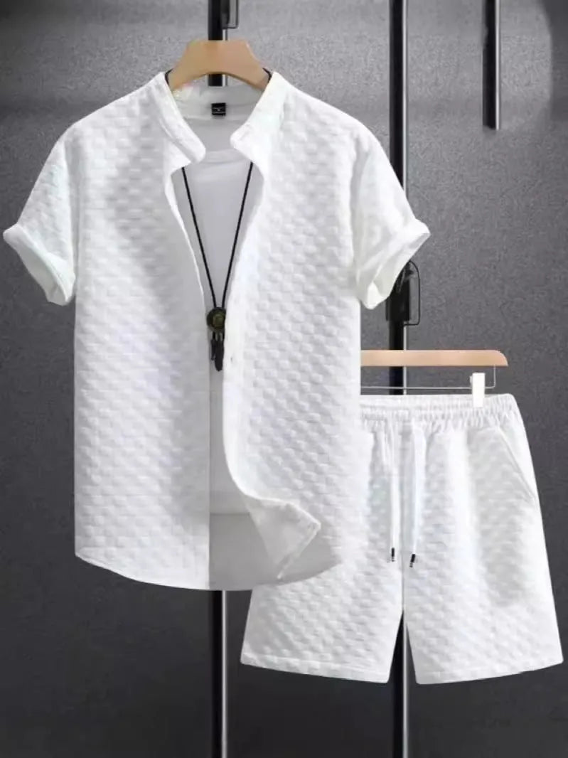 Short sleeve jacket and matching shorts suit set in a solid Jacquard colour on a hanger.
