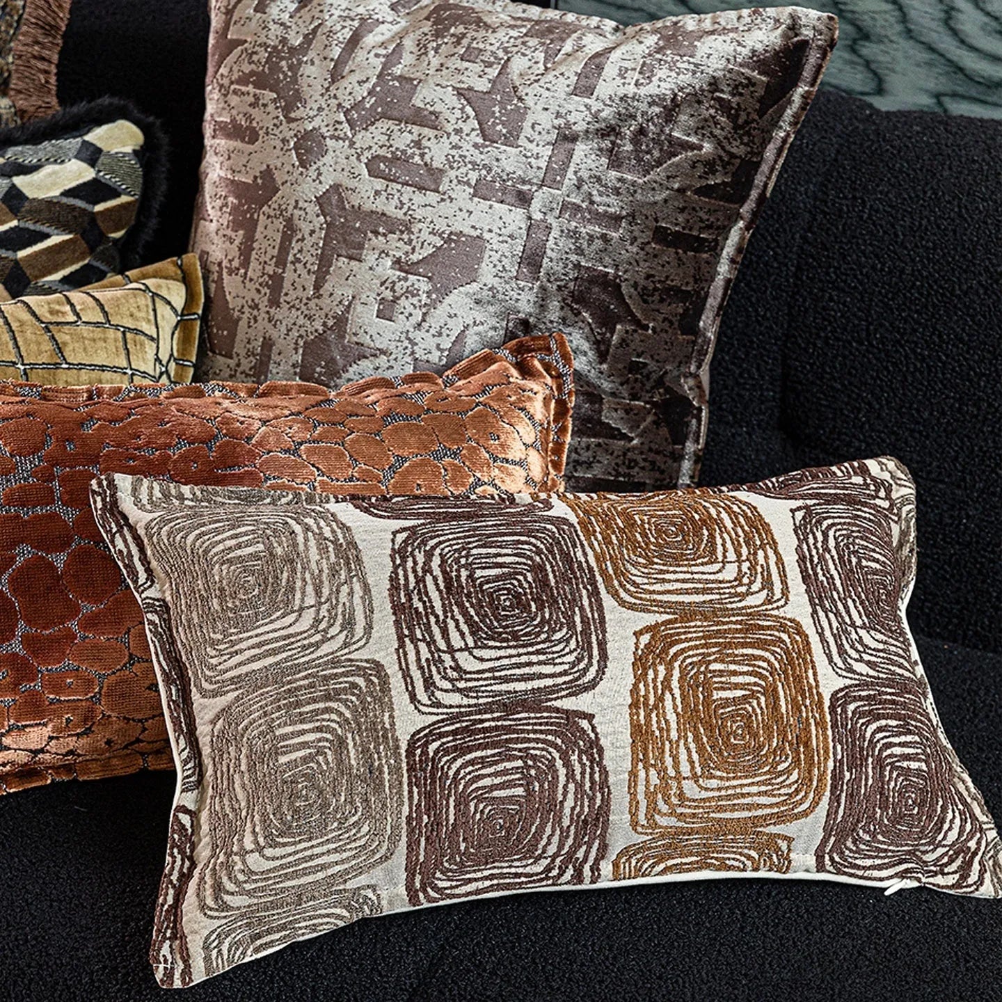 Square and waist pillow covers with cream and coffee abstract coil pattern