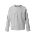 Man modelling a simple black loose-fit long sleeve cotton pullover shirt.