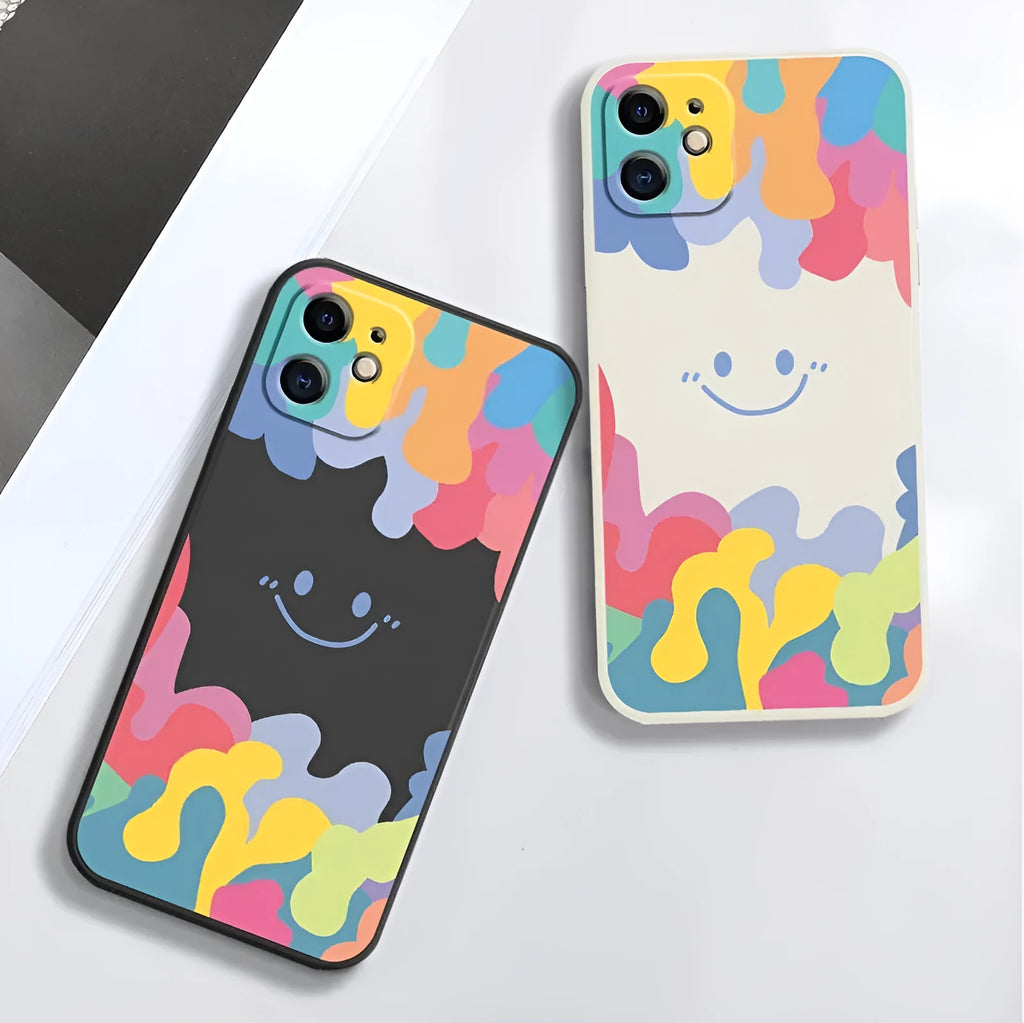 Rainbow smiley face design on white or black camouflage TPU iPhone case with attached carrying lanyard