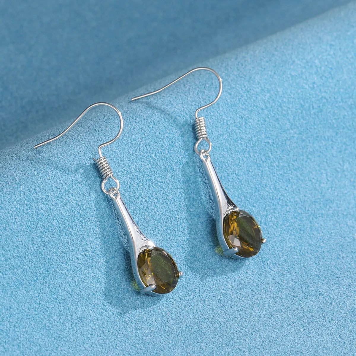 Olive green topaz water drop shaped earrings with retro style and electroplated alloy construction