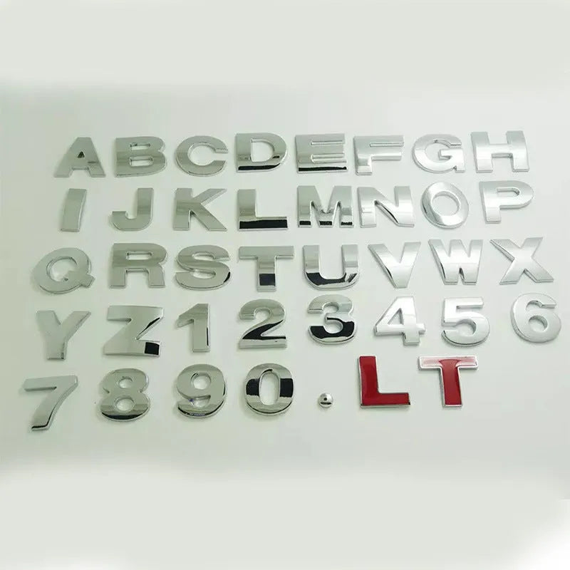 3D metal car letter stickers showing raised zinc alloy characters in black and silver finishes