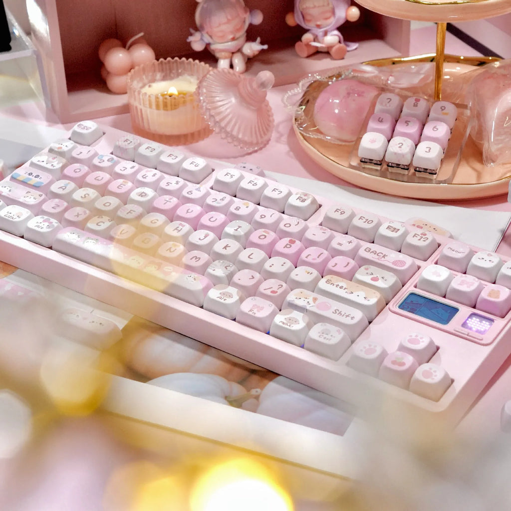 Pink cartoon MOA height plastic keycaps with five-sided sublimation arranged in a full set layout.