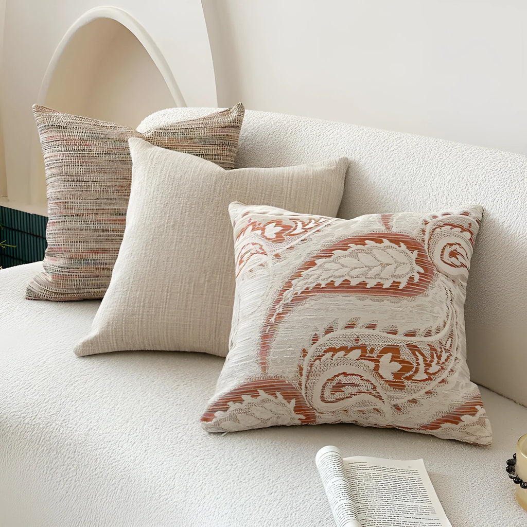 American-style paisley jacquard sofa backrest cushion in Amber colour on a grey sofa.