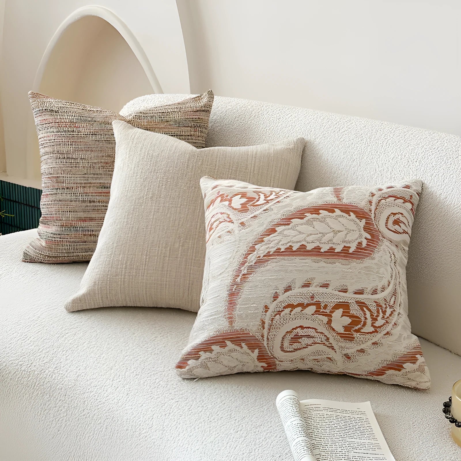 American-style paisley jacquard sofa backrest cushion in Amber colour on a grey sofa.