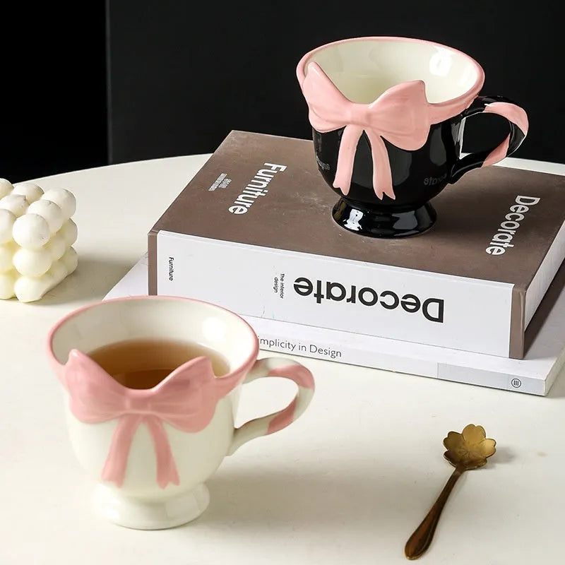 Ceramic heart bow mug with 350ml capacity in black pink colour option