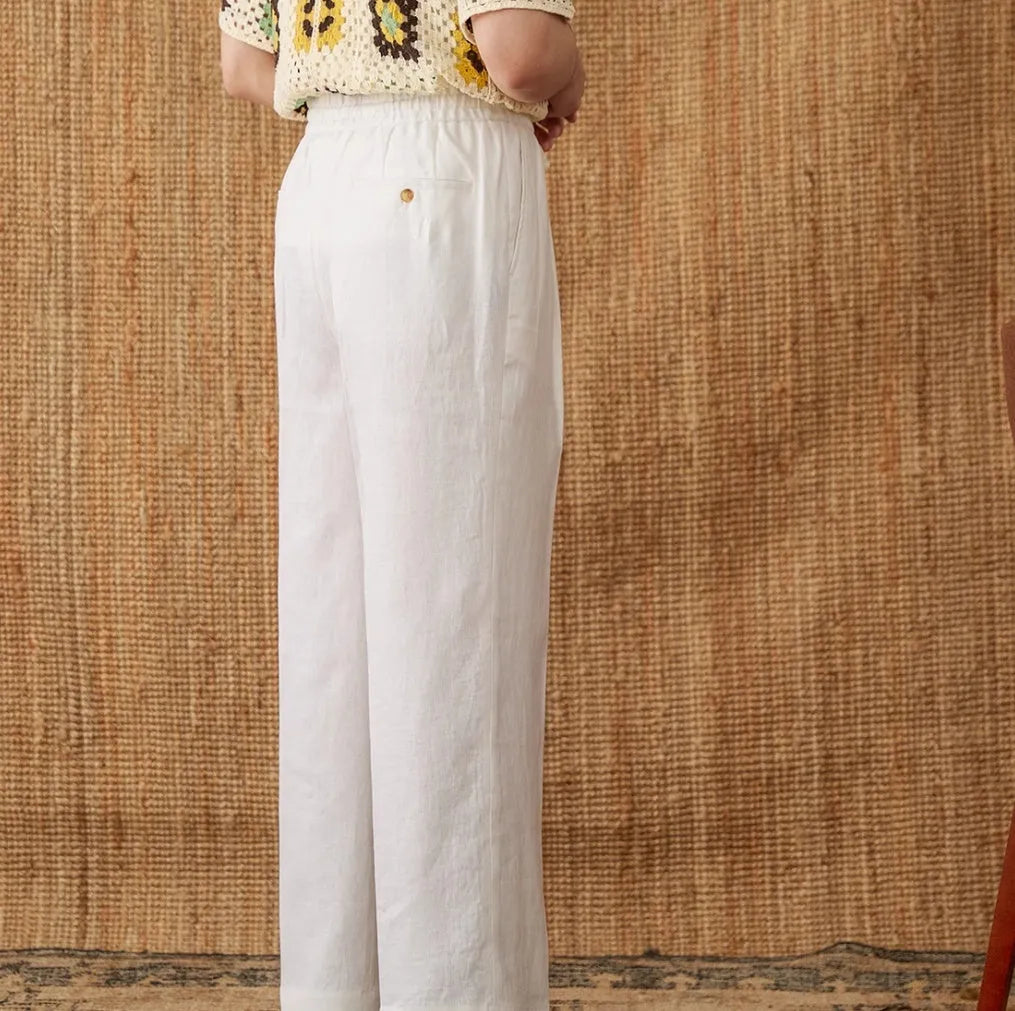 Linen loose high waist trousers with elasticated waistband in straight-leg cut