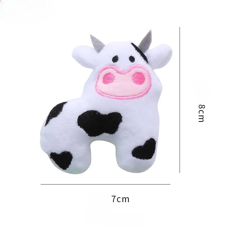 A plush cat toy in the shape of a cow, crocodile, or parrot, filled with catnip for interactive play.