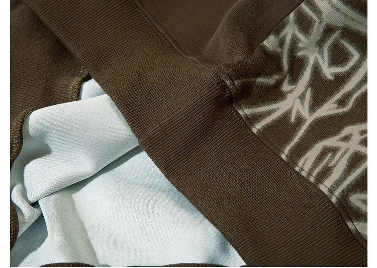 Loose-fitting couples oversize hoodie in brown, round neck, long sleeves, side view on plain background