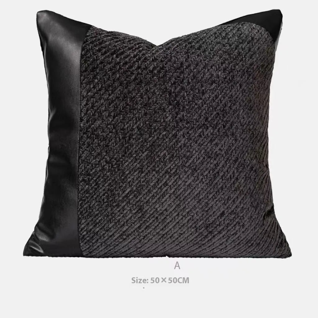 Modern grey and white plaid bed runner blanket set with a pillowcase and leather round pillow on a 1.5m bed.
