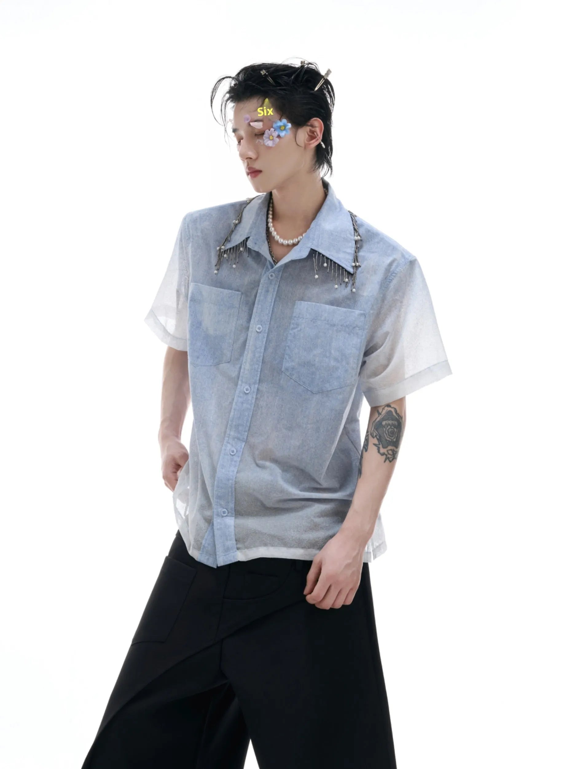Men's blue and white gradient loose-fit short sleeve shirt on a hanger