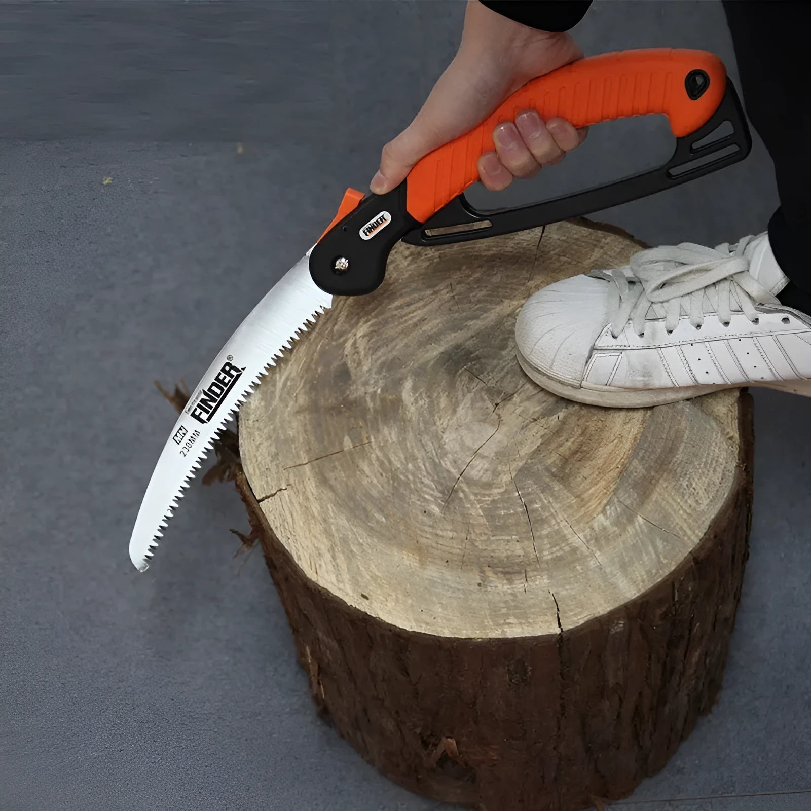 Folding garden saw with 230mm steel blade and TPR grip handle in open position