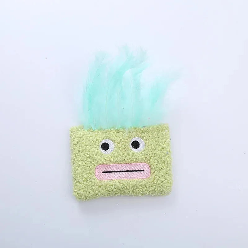 Blue plush cat toy shaped like a big mouth explosion head with catnip inside.