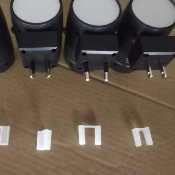 White direct plug night lamp with adjustable brightness and rotatable light head