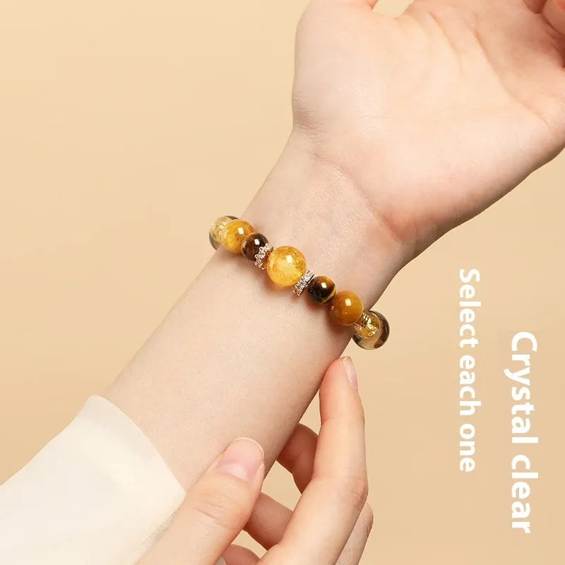 Yellow tiger-eye crystal bracelet with geometric tower pattern in 10mm and 12mm size options