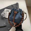 Blue one-shoulder cross-body bucket messenger bag with synthetic leather lining