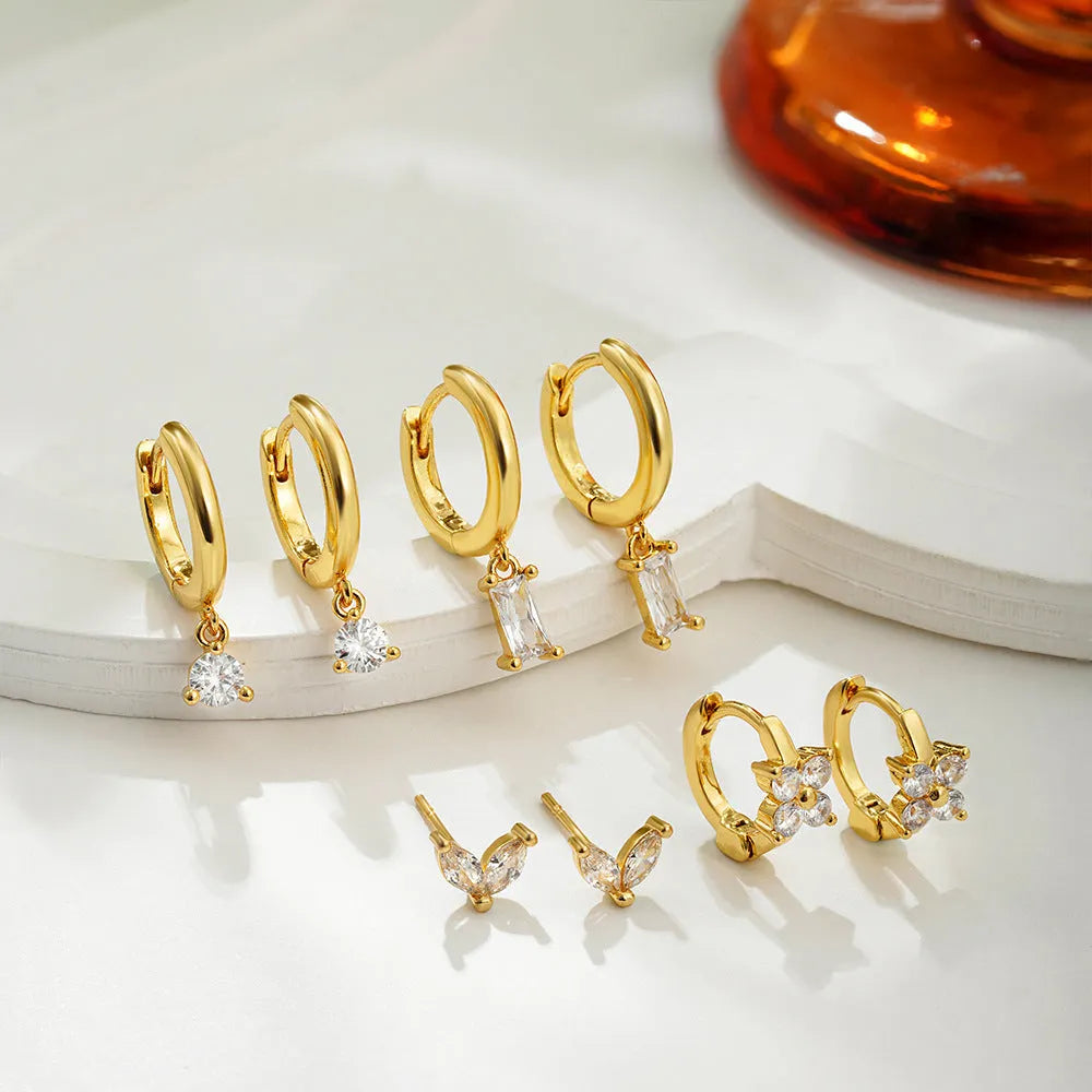 Copper geometric square earrings set with star designs in gold or silver electroplated finish