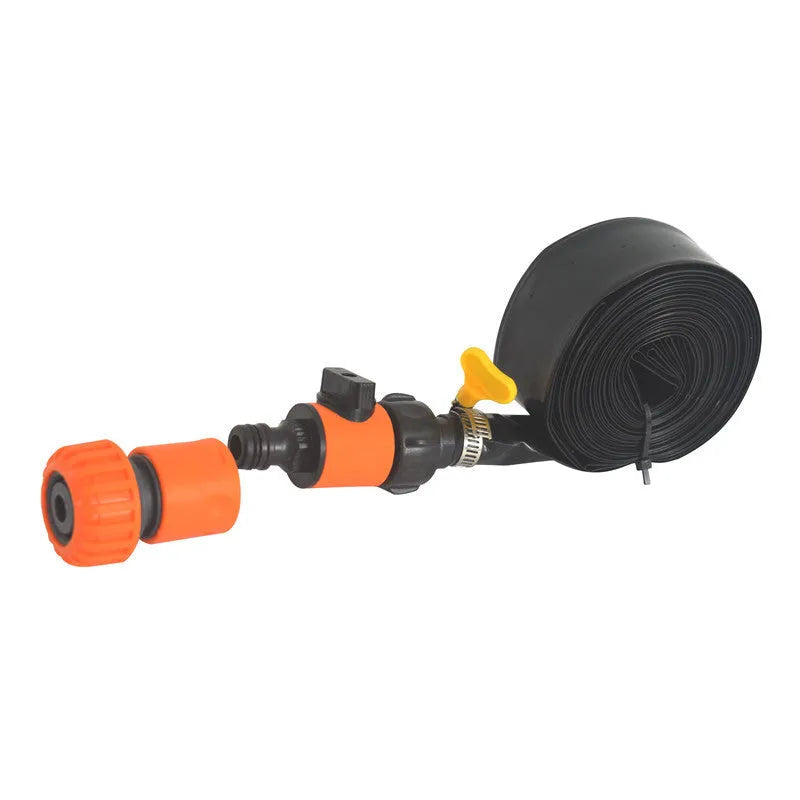 Blue portable PVC garden sprinkler with solar panel on green grass.