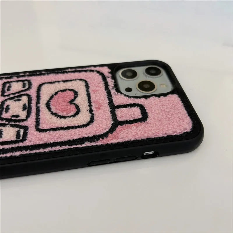 Pink towel embroidered TPU back cover case for iPhone on a table