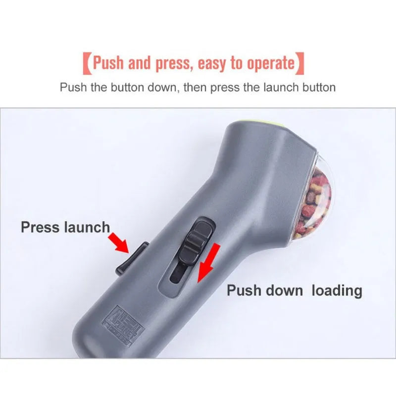 Grey plastic dog training toy with snack catapult launcher showing 18cm portable design