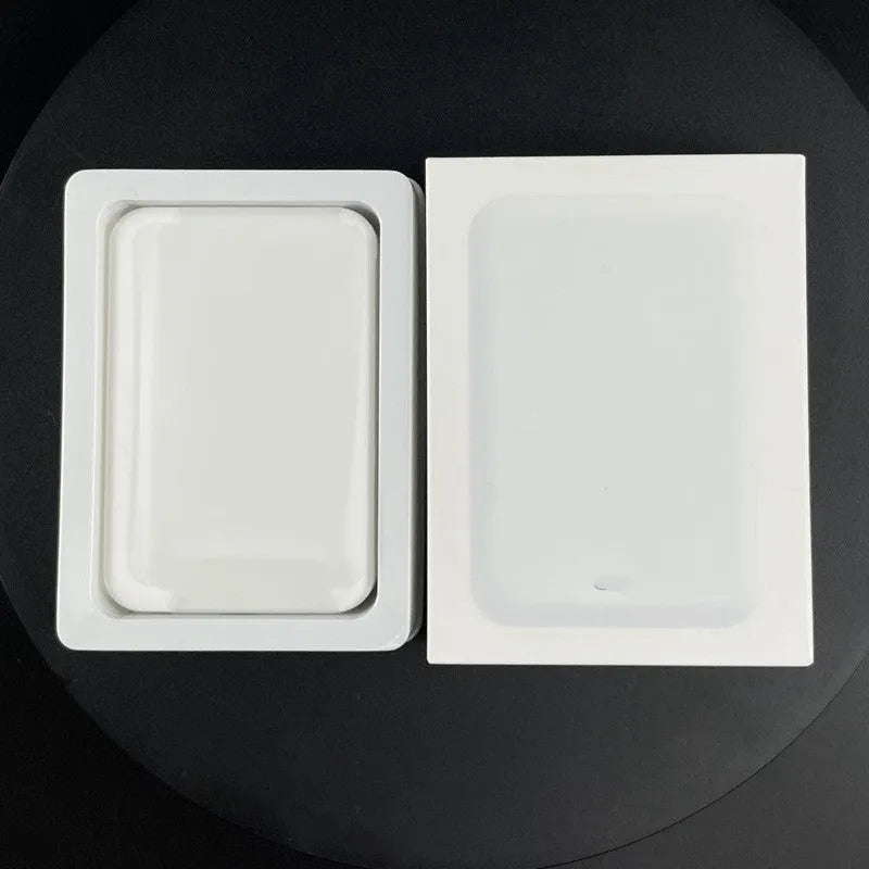 White magnetic wireless power bank with 5000mAh capacity showing creative design and compact dimensions