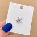Geometric-shaped copper brooch with electroplated finish in six colour options for women's fashion