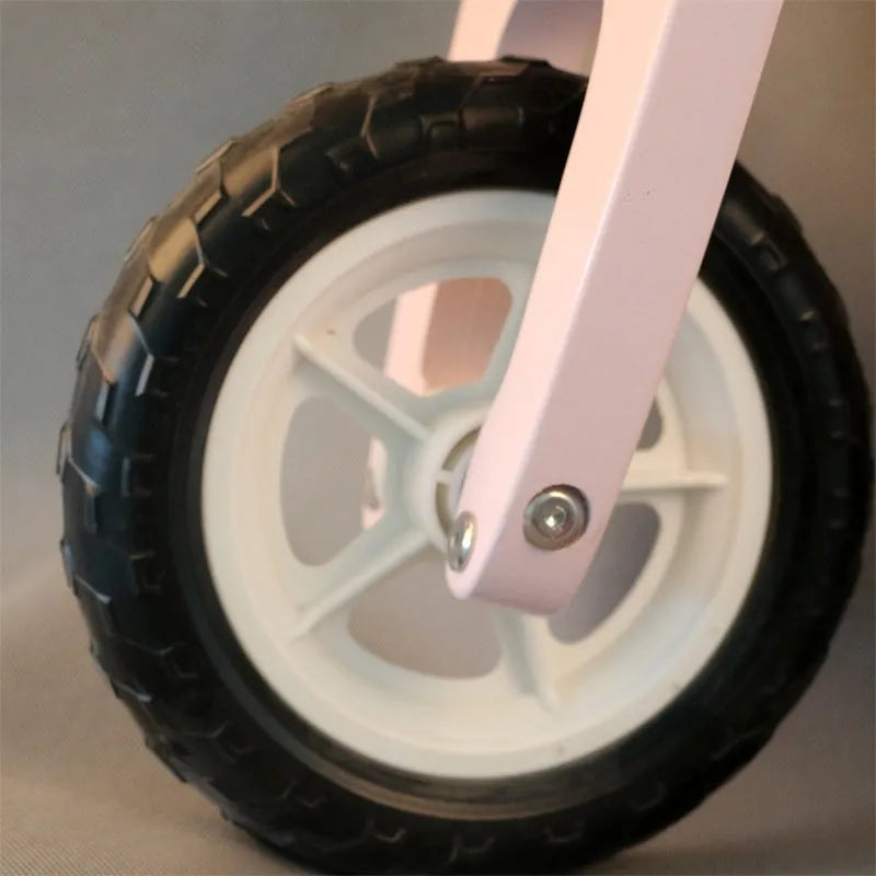 Pink wooden balance scooter for toddlers aged 1-6 years, 10-inch size.