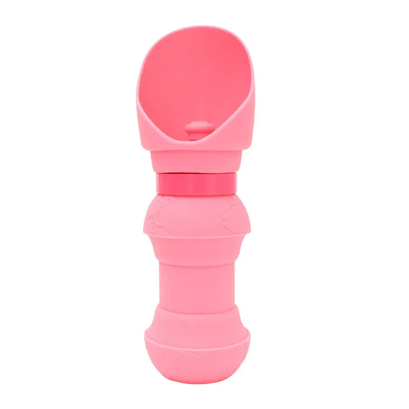 Silicone folding dog water cup shown in mint green colour, unfolded and flat.