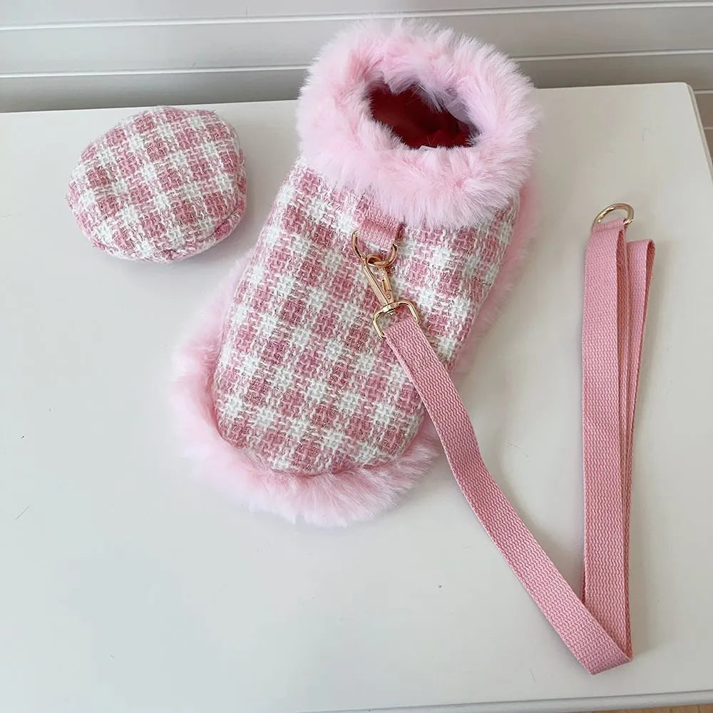 Pink cat costume with cloak and hand holding rope on cat, showing chest and back traction design