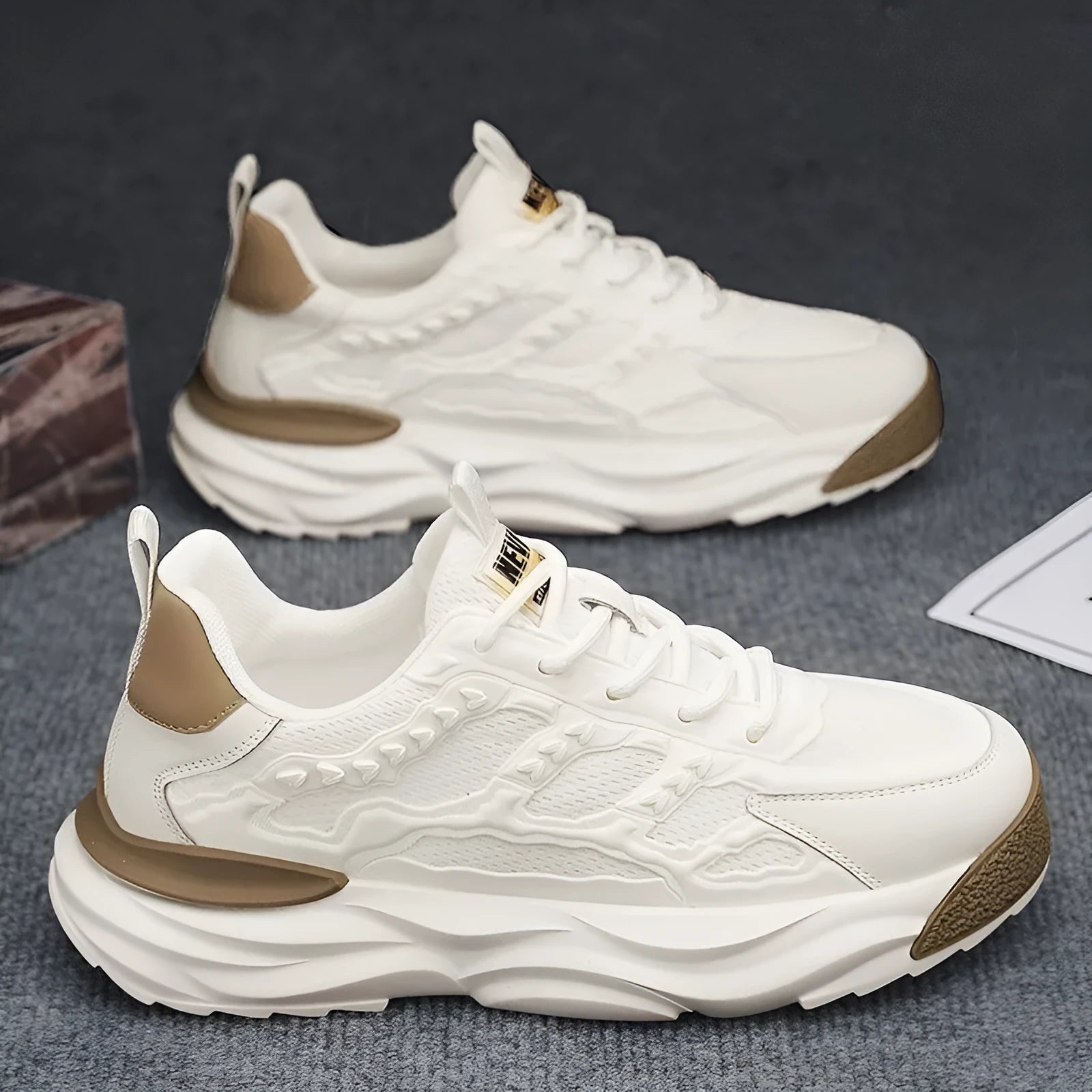 Men's white and black breathable mesh shoes with round toe design available in sizes 39-44