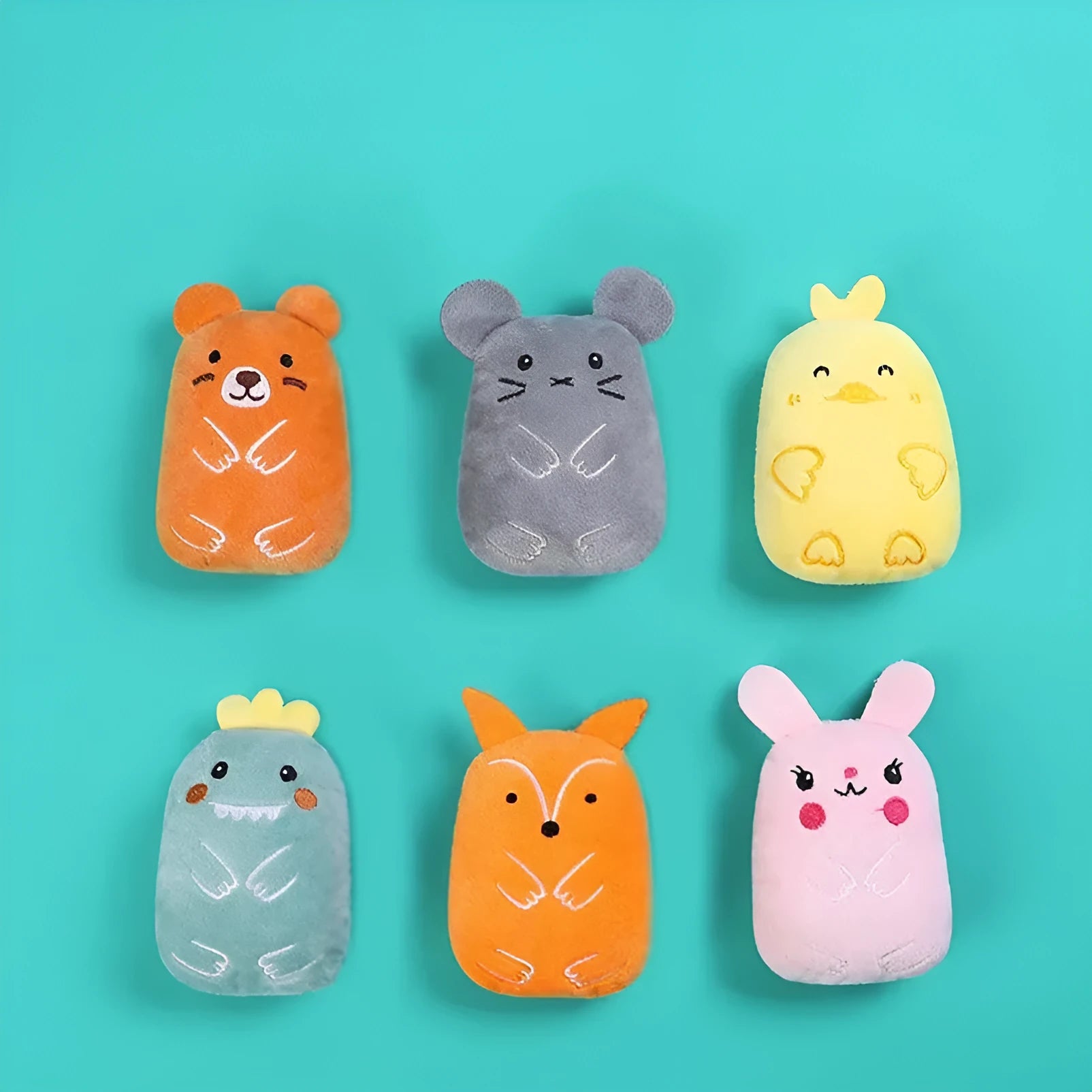Small plush catnip toy with a squeaker for cats to chew and bite, shown in assorted colours.
