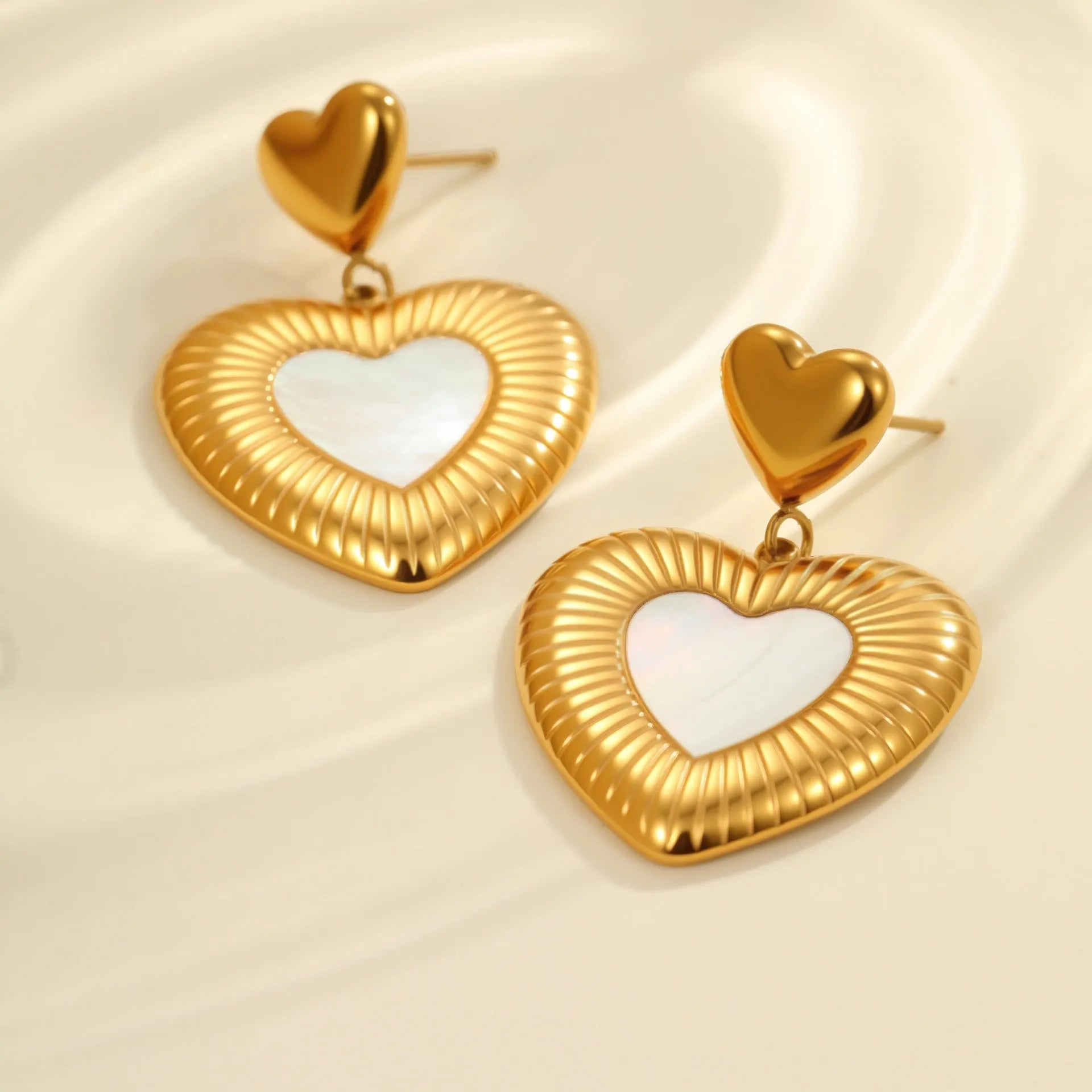 Gold heart-shaped stainless steel earrings with 18K electroplating for women's office fashion