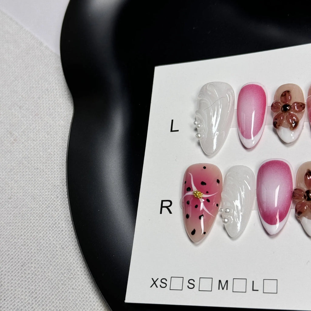 Hand-painted 3D carved nail art patches with candy patterns for almond-shaped nails.