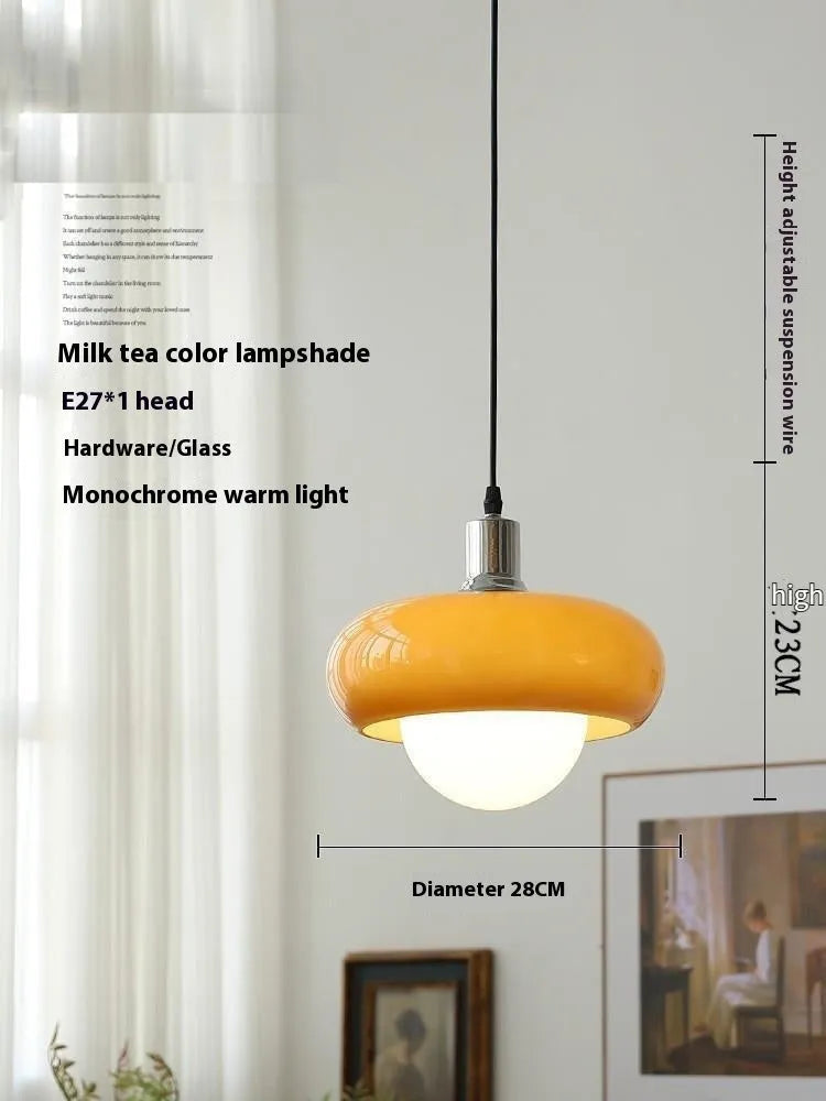 Bauhaus style three-headed pendant light with milk white egg tart glass shades