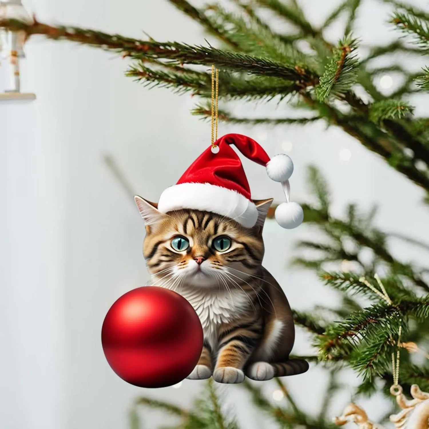 Cartoon style creative kitty Christmas ornament hanging in a car, made from clear acrylic.