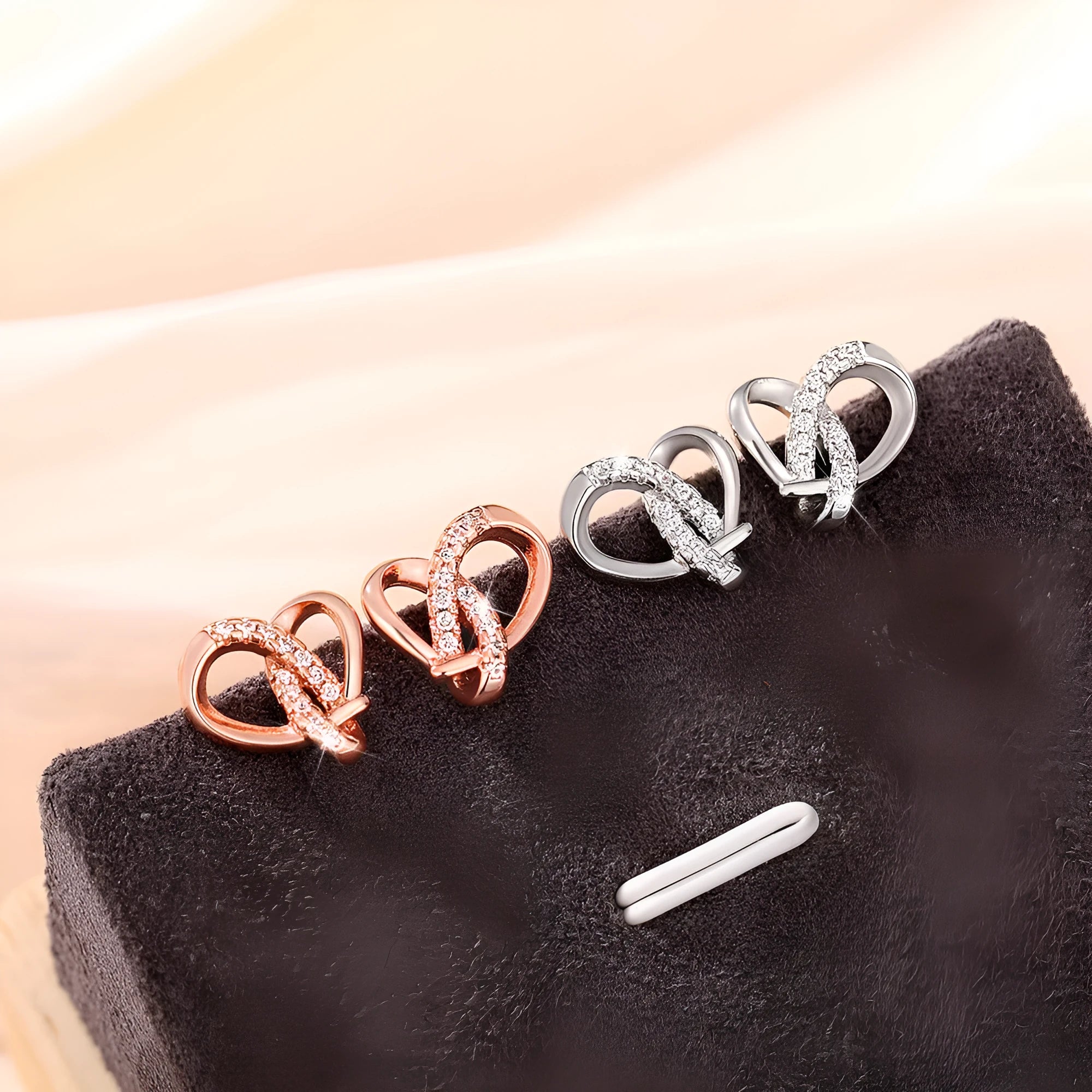 Simple copper winding triangle heart-shaped earrings with micro-inlaid zircon in white gold and rose gold colour options