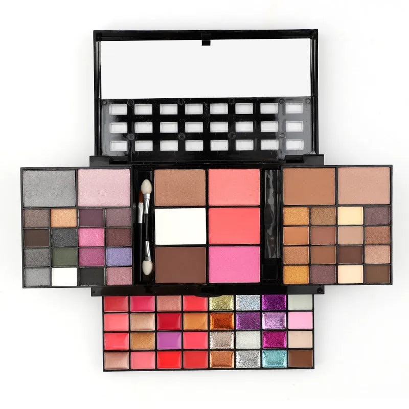 74 colour makeup palette open showing eyeshadows, lip glosses, and face powders with brushes