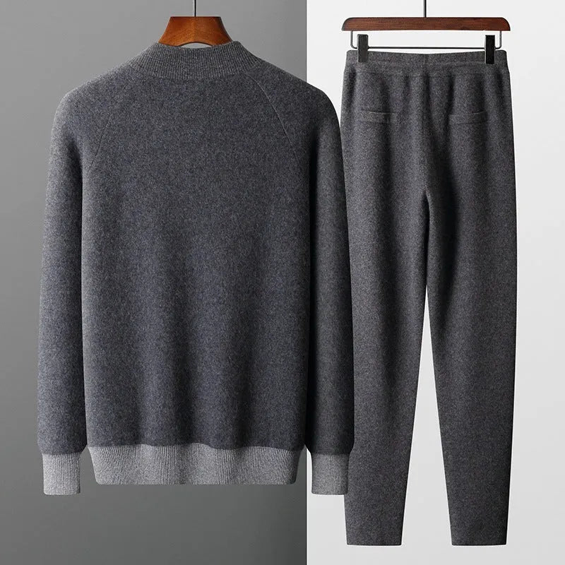 Man wearing a camel-coloured cashmere blend half turtleneck zip cardigan and matching trousers.