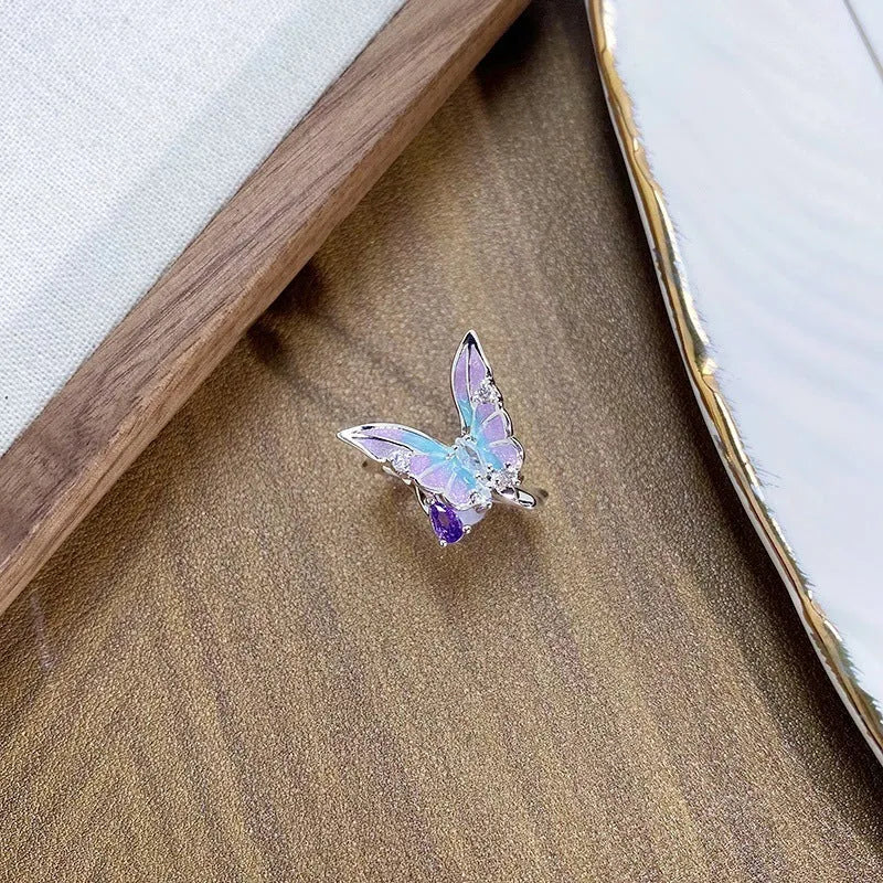 Adjustable copper ring with insect design and dripping oil texture in selectable colours.