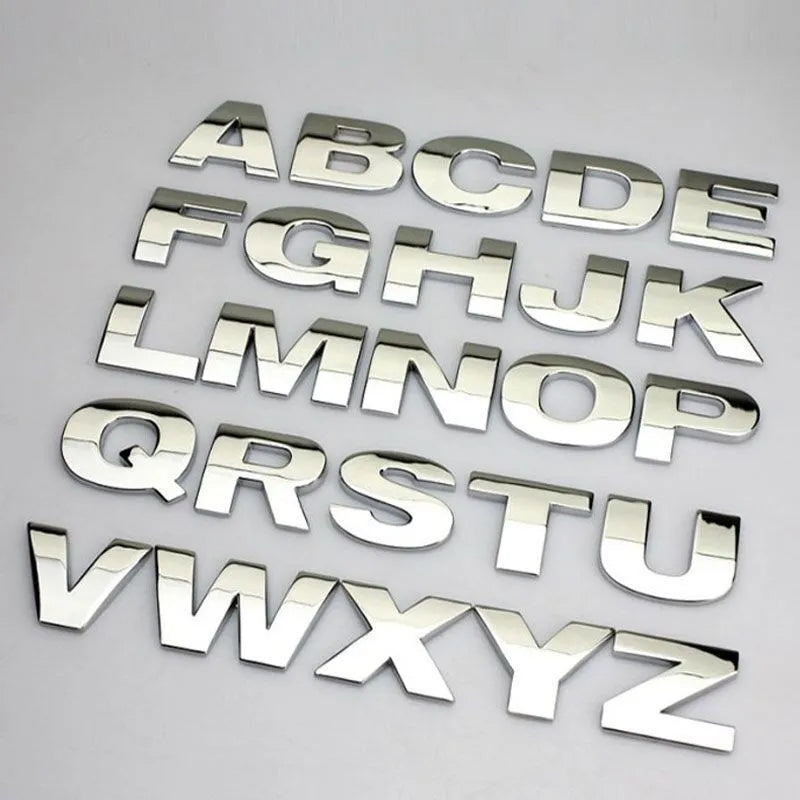 3D metal car letter stickers showing raised zinc alloy characters in black and silver finishes