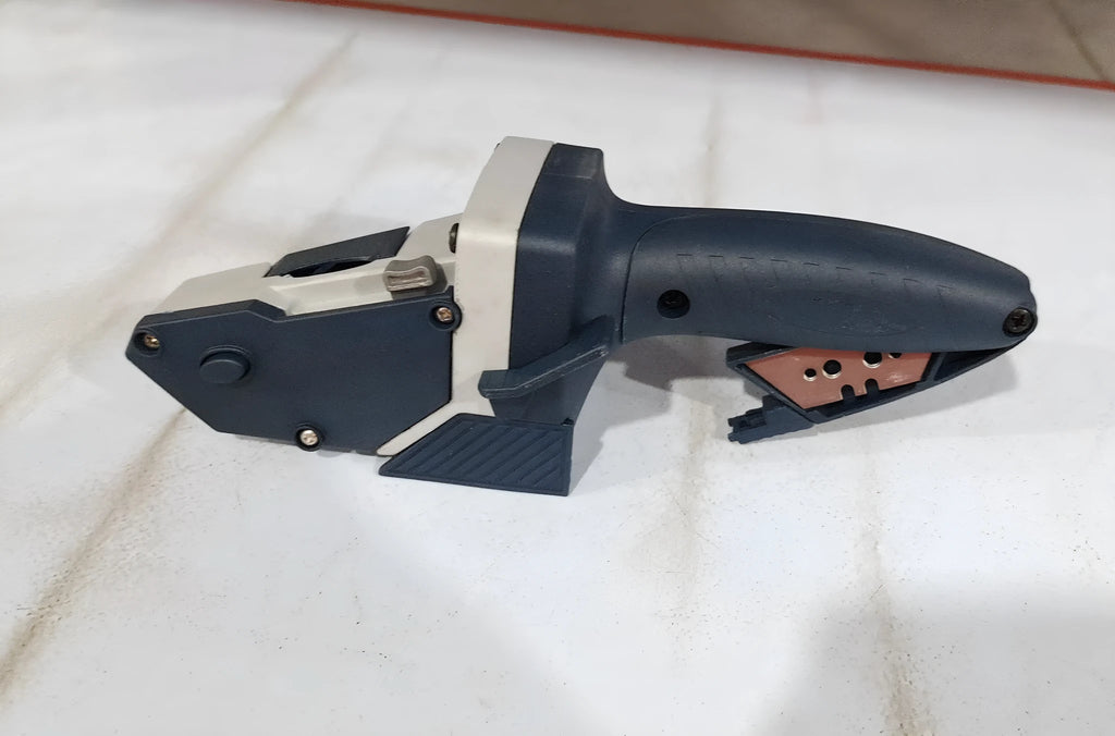 Blue multifunctional woodworking cutter with aluminium alloy body and one-press lock.