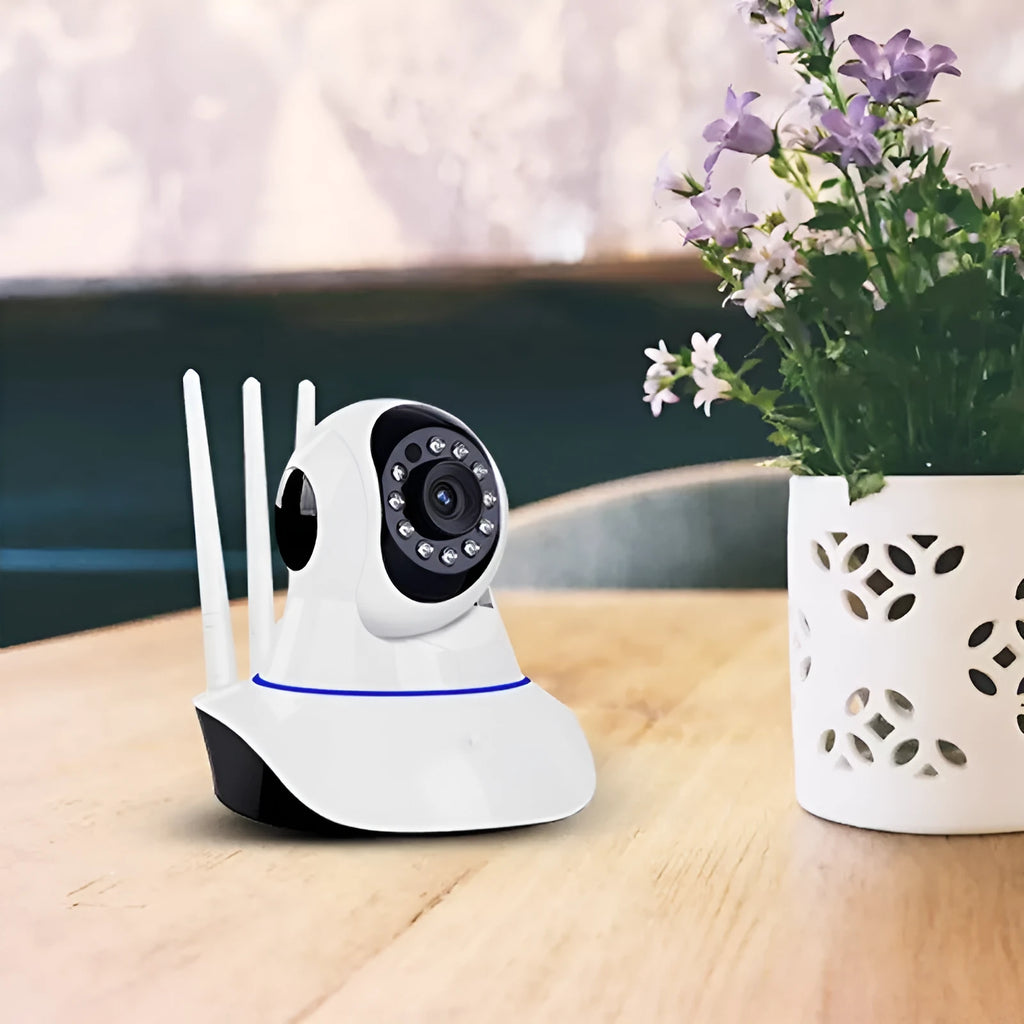 White wireless dome security camera for indoor and outdoor HD surveillance.