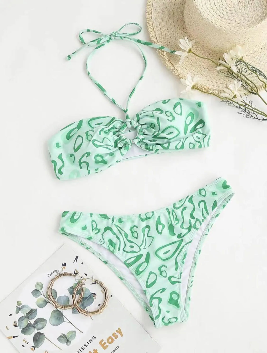 Blue floral bandeau bikini with split design and matching briefs