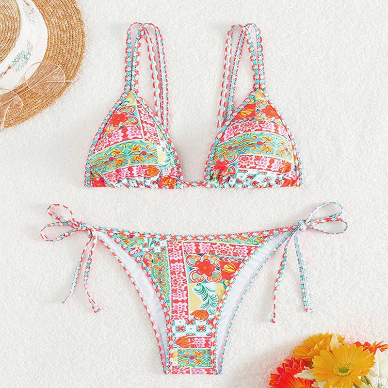 Women's lace-up front split-leg swimsuit in picture colour with brief style bottoms