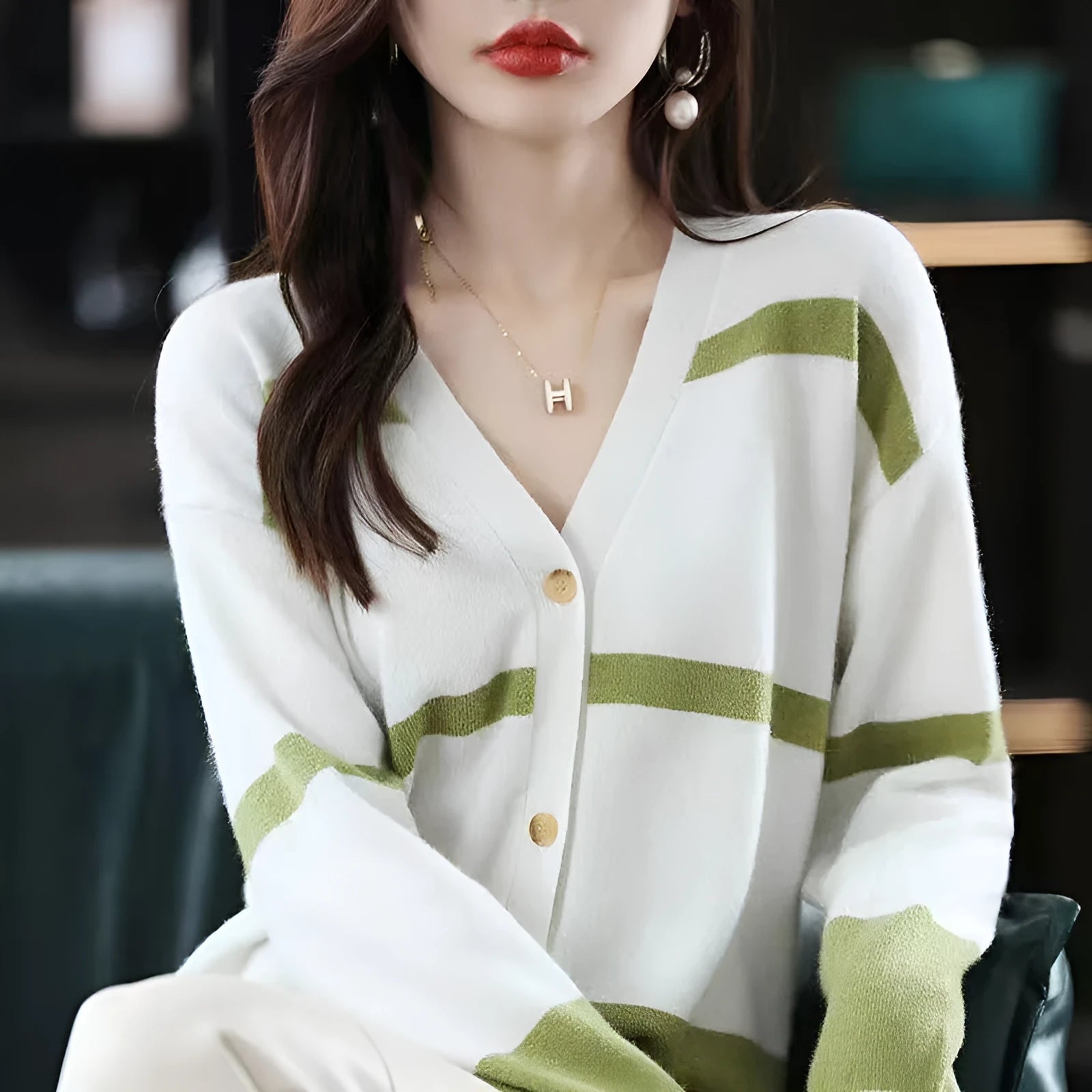 Women's slim fit V-neck cardigan with 3D striped pattern and buttons in four colour options.