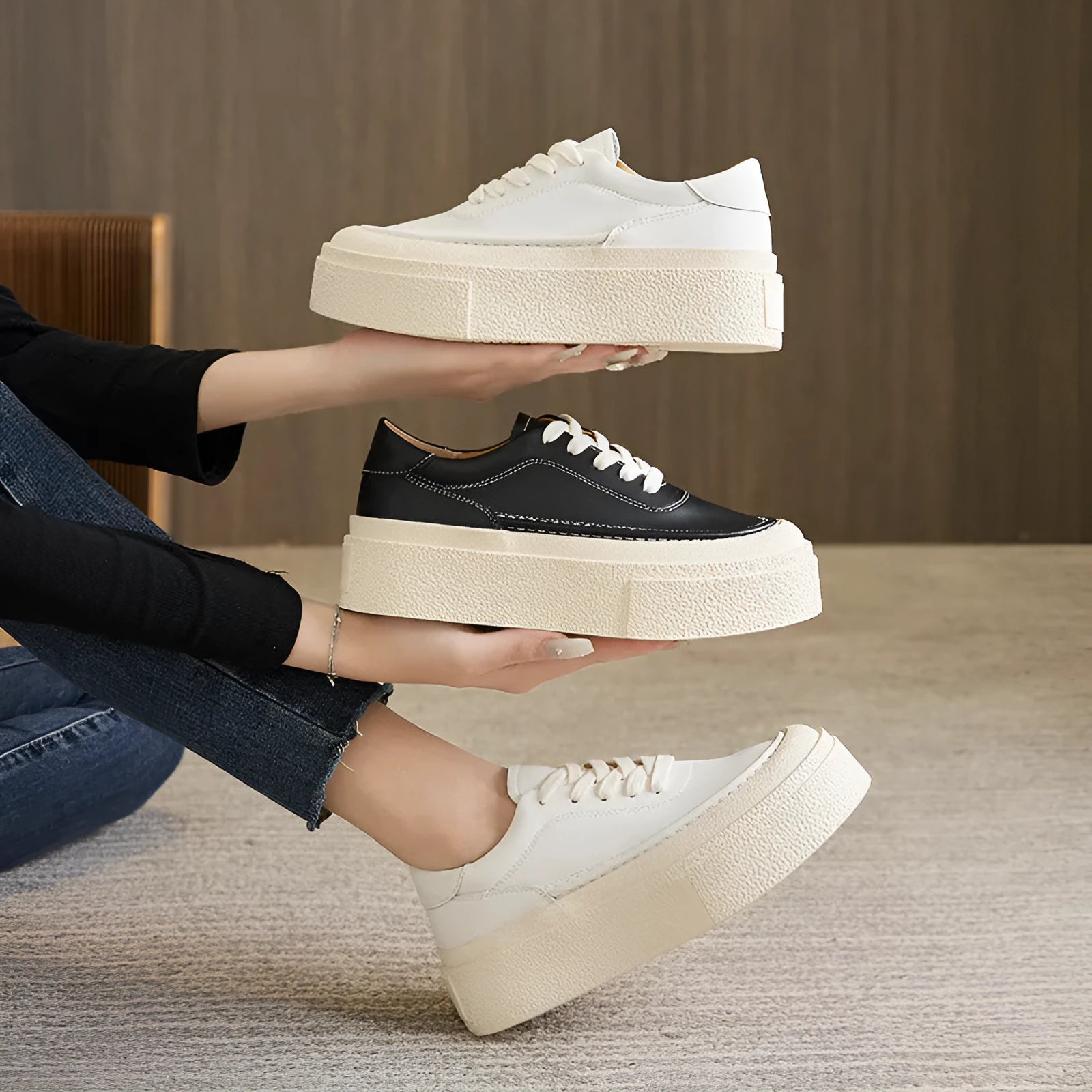 Women's black platform board shoes with embossed cowhide leather upper and round toe design