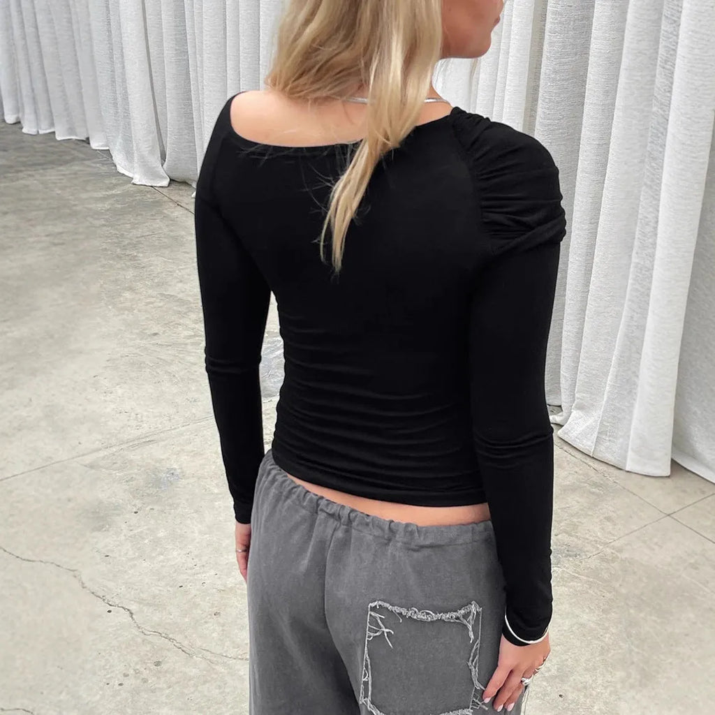 Black American Spicy Girl knot hem long sleeve top with stretch fabric, front view